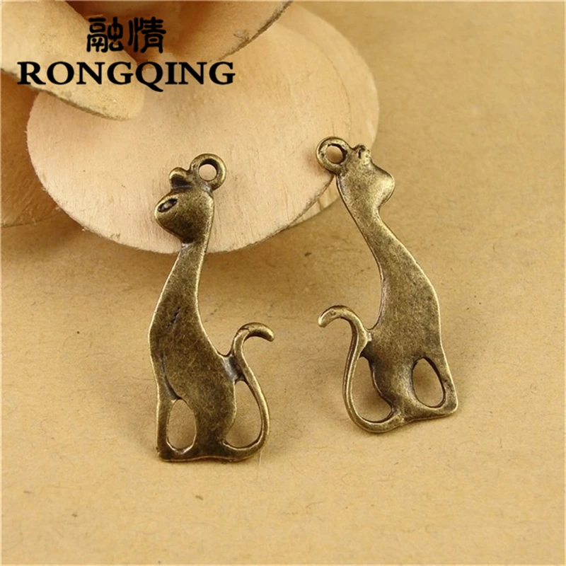 

RONGQING 50pcs/lot 27*11MM Cat lovely Antique Bronze Dove Pendant for Jewelry Accessories Bird of Peace