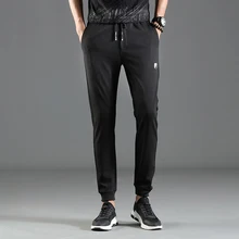 Модные весенние мужские брюки спортивные брюки мужские Бодибилдинг длинные тренировки эластичные хлопковые брюки на завязке джоггеры