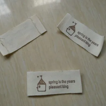 

1000PCS Custom beige cotton baby clothing label handicraft sewing accessories print logo 5 * 2 cm