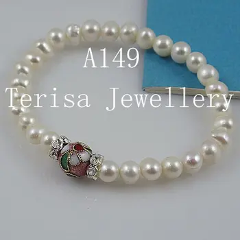 

New White color Grade AA 6-7MM Natural Fresh Water Pearls made with Cloisonne Size:8mm Length:7.5inch,Elastin Bracelt