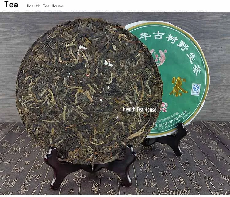 2012 Yr Yi Wu Millenary Old Tree Wild Shen Pu-erh 357 г, ветреное специальное железное сырье Pu-erh торт