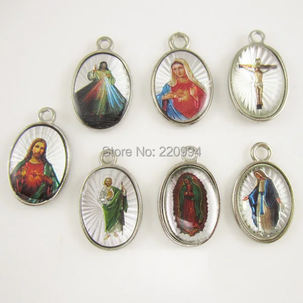 

50pcs of Assorted seven religious images double sided our lady of guadalupe rosary pendant