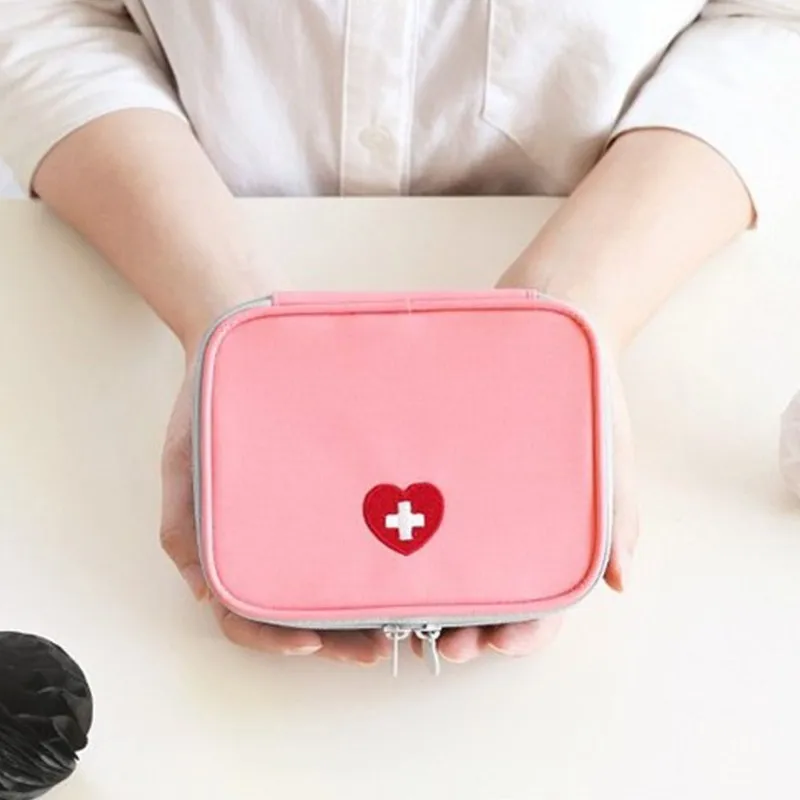 Portátil de viaje de moda Mini medicina bolsa de Kit de primeros auxilios al aire libre Camping viaje casa supervivencia Kit médico
