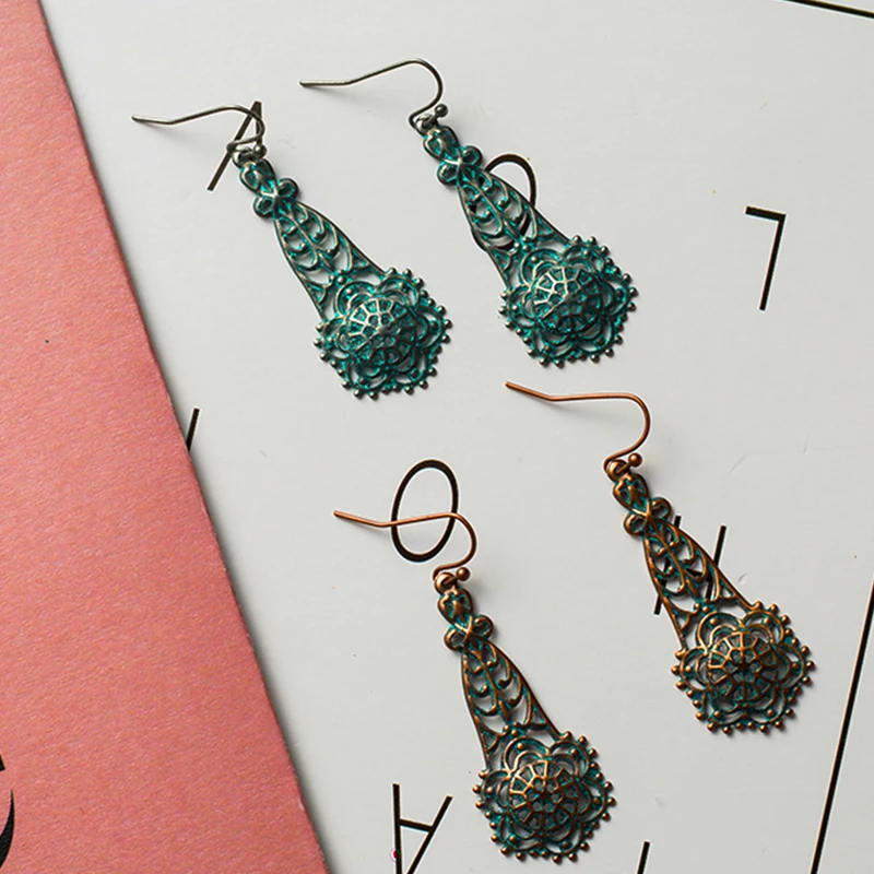 

Boho ethnic geometric flowers dangle earrings for women Bohemian vintage hollow bronze alloy hanging earring Charm jewelry 2019