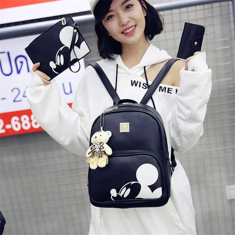 

2019 new Disney Mickey four-piece backpack + Card package + Pendant + Envelope casual student backpack travel bag