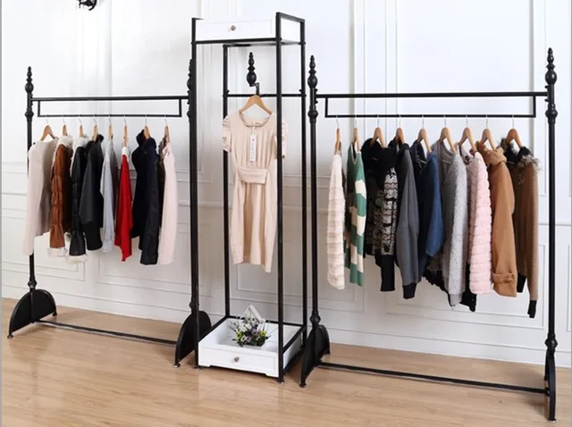European High Grade Iron Creative Men And Women Clothing Store Display Racks Island Shelf Floor European High Grade Iron Creative Men And Women Clothing Store Display Racks Island Shelf Floor