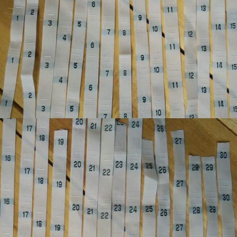 

Number 1-30 White polyester cloth size labels Baby size label 100 pcs only for 1 size/lot -- Remark the order size