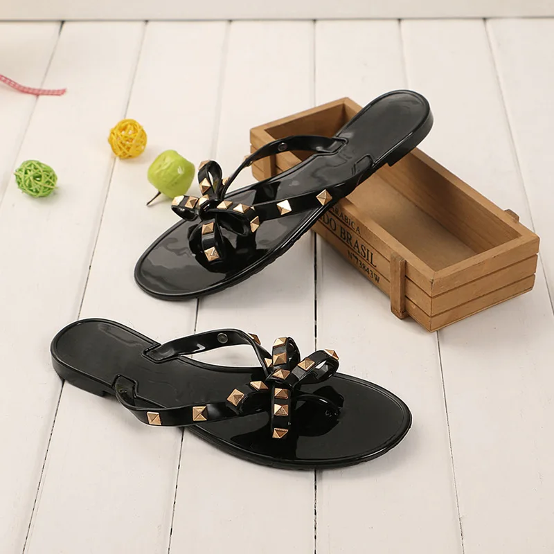 

ZHENZHOU Women's shoes Summer new sandals slippers Flat with bow rivets slippers Flip-flops Garden jelly beach sandals