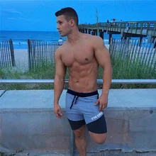 Мужские пляжные шорты, сексуальные пляжные бермуды, летние мужские шорты из хлопка, повседневные спортивные штаны, шорты для фитнеса и бега