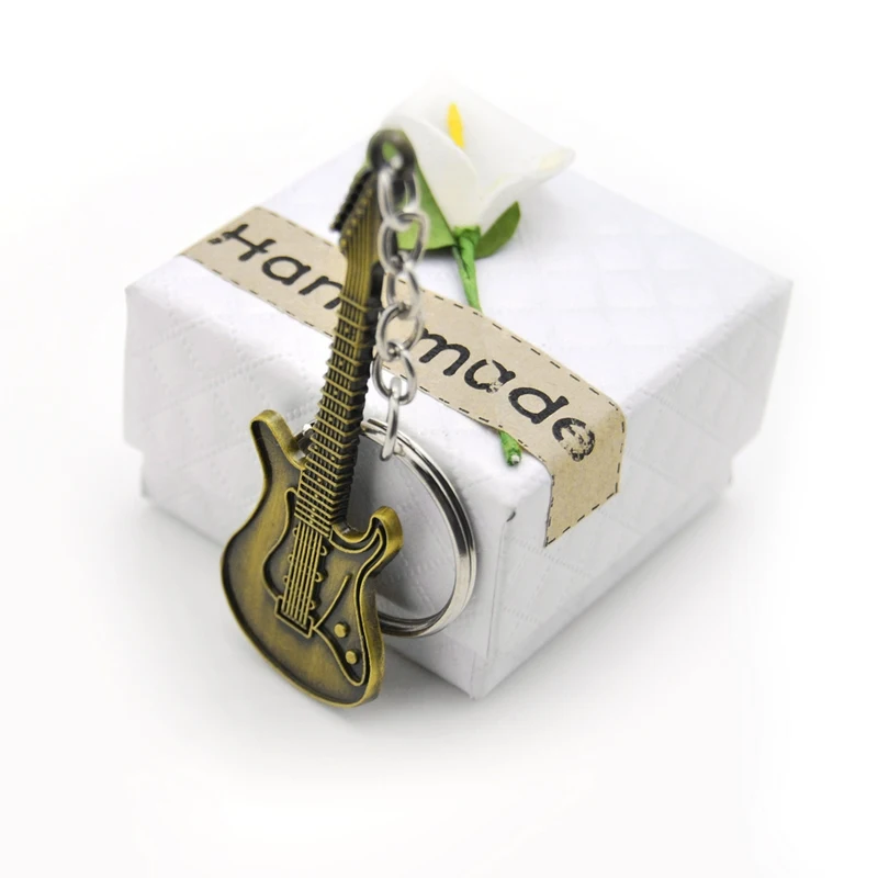 

Original New Fashion Vintage Gold Unique Guitar Keychain Purse Bag HandBag Pendant Charms Car Keyring Women Key Chain Ring Gift