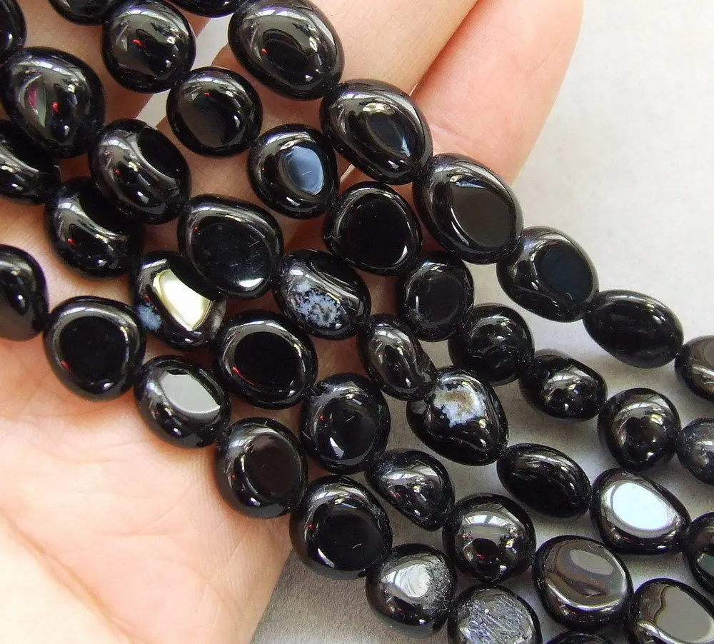 

8SE10149 Onyx 9x10mm Smooth Nugget Beads