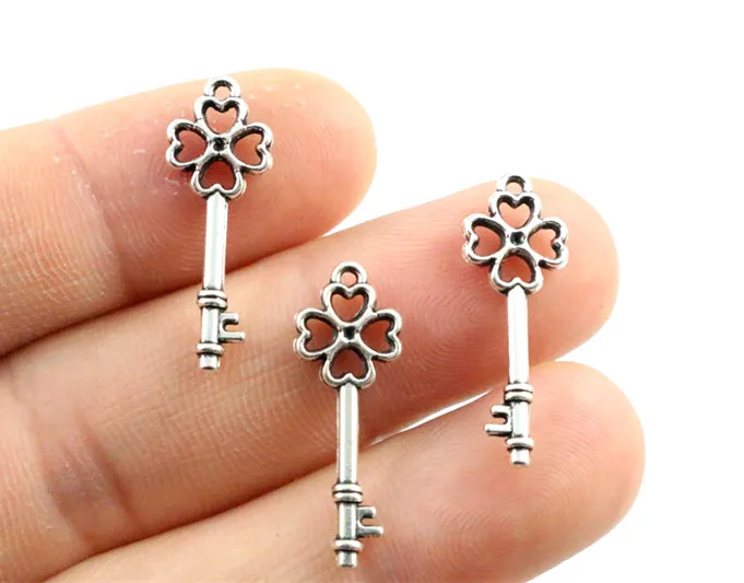 40PCS Vintage Silver Tone Zinc Alloy Skull Charms Pendant Jewelry 21*21*2mm