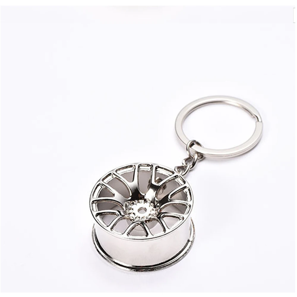 

Metal Car Parts Model Key, Chain Motor Hub Valve Piston Engine Rotate Keyring