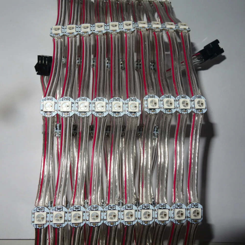 

DC5V WS2812B 100pcs/string addressable rgb full color pixel light;5cm wire spacing;with transparent wire