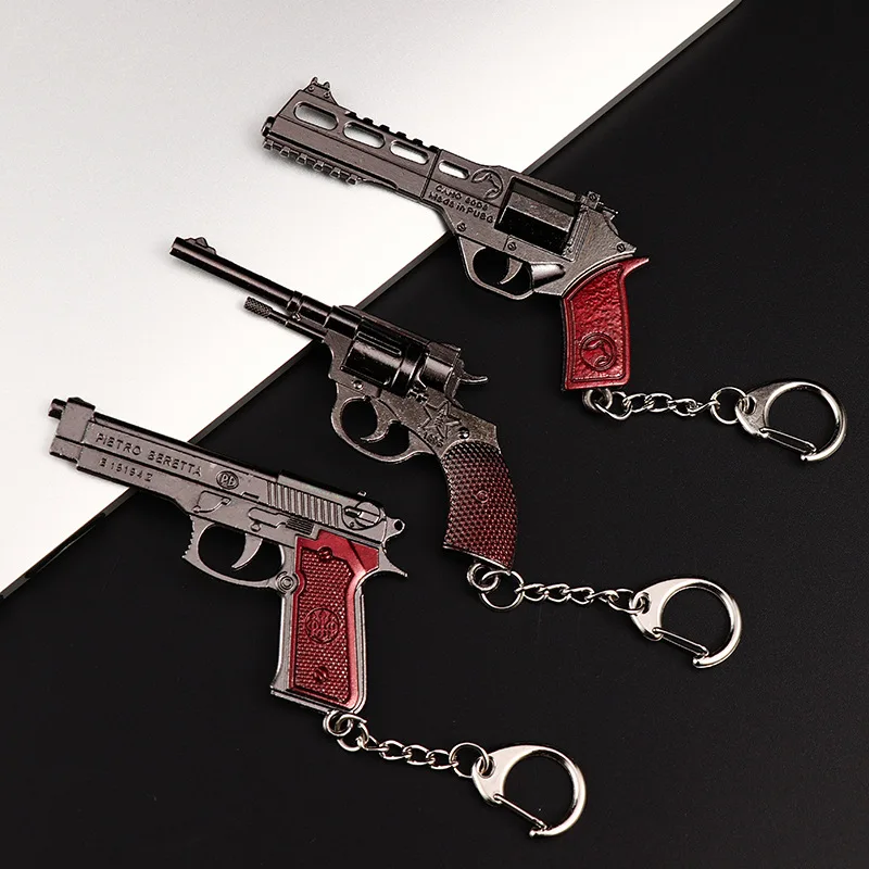 

The New Fashion Miniature Revolver Pistol Weapon fashion Model Key Ring Mini Gun key Chain For Men Jewelry Surprise Gift