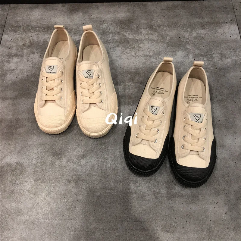 

2018 new retro casual canvas shoes women's fashion solid color flat shoes women's shoes.