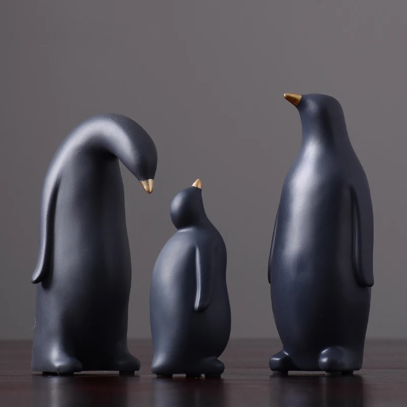 resin penguin statues