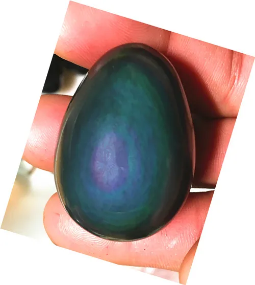 

Natural quartz crystal blue rainbow cat eye obsidian egg...