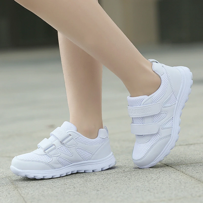 white sports shoes boys