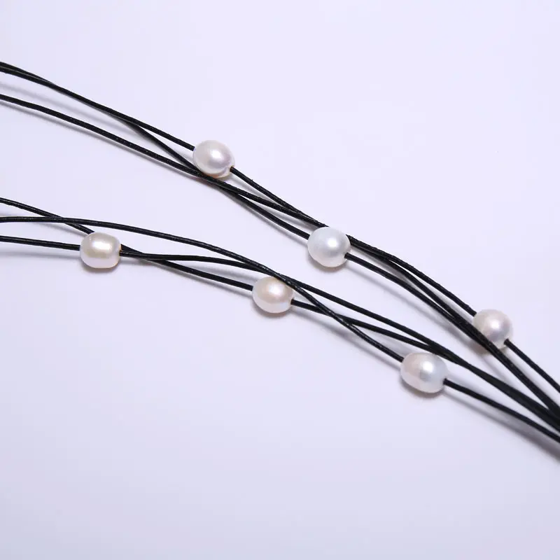 Black Leather 10-11 mm String Pearl Necklace 68 cm Long, 5 Star Pendant 10.5 cm Long