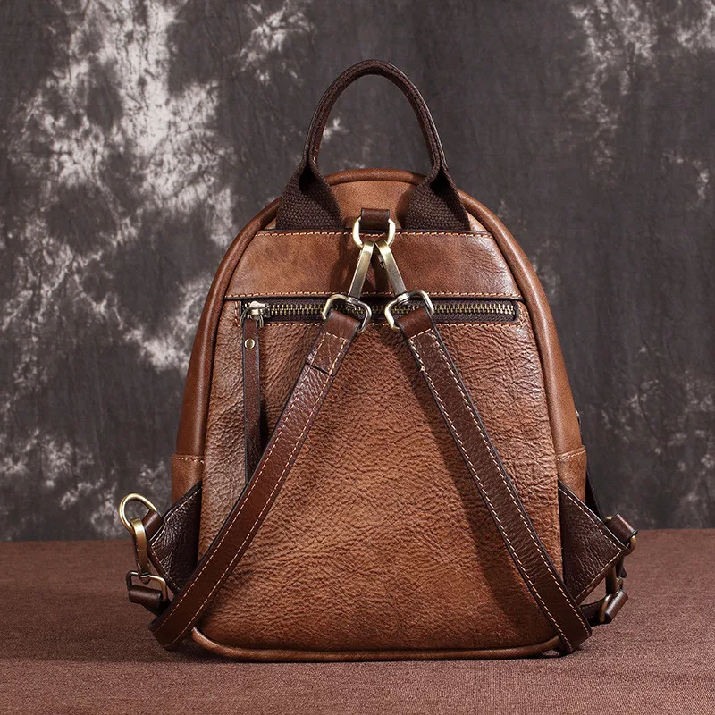 PNDME high quality vinateg top layer cowhide ladies backpack casual embossed genuine leather daily female small sling rucksack PNDME high quality vinateg top layer cowhide ladies backpack casual embossed genuine leather daily female small sling rucksack