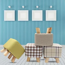 現代の正方形の木製フットスツールオットマンプーフスツール北欧ファブリックフットレストパッド入りシート布張りフットスツール(China)