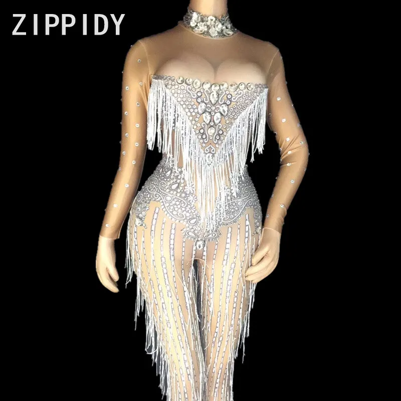 white jumpsuit with rhinestones