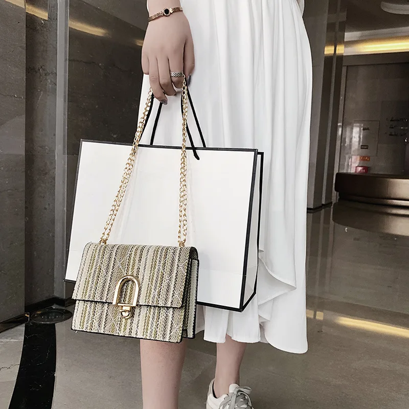 

New stripe simple beautiful lady bag horizontal square magnetic button metal small square bag sweet lady software bag