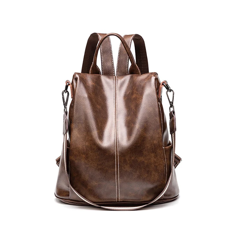 

Solid color retro high quality oil wax leather large capacity waterproof backpack couple models Korean version of the backpack
