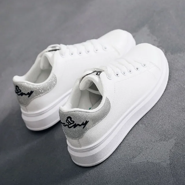white sports shoes for girls