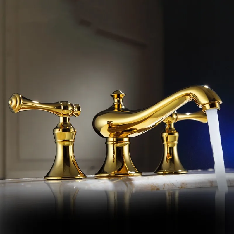

Luxury gold brass bathroom sink faucet Two handle three holes High-grade Artistic basin faucet mixer Hot and cold water tap