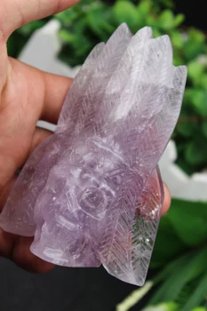 

Natural quartz crystal purple feather skull to heal