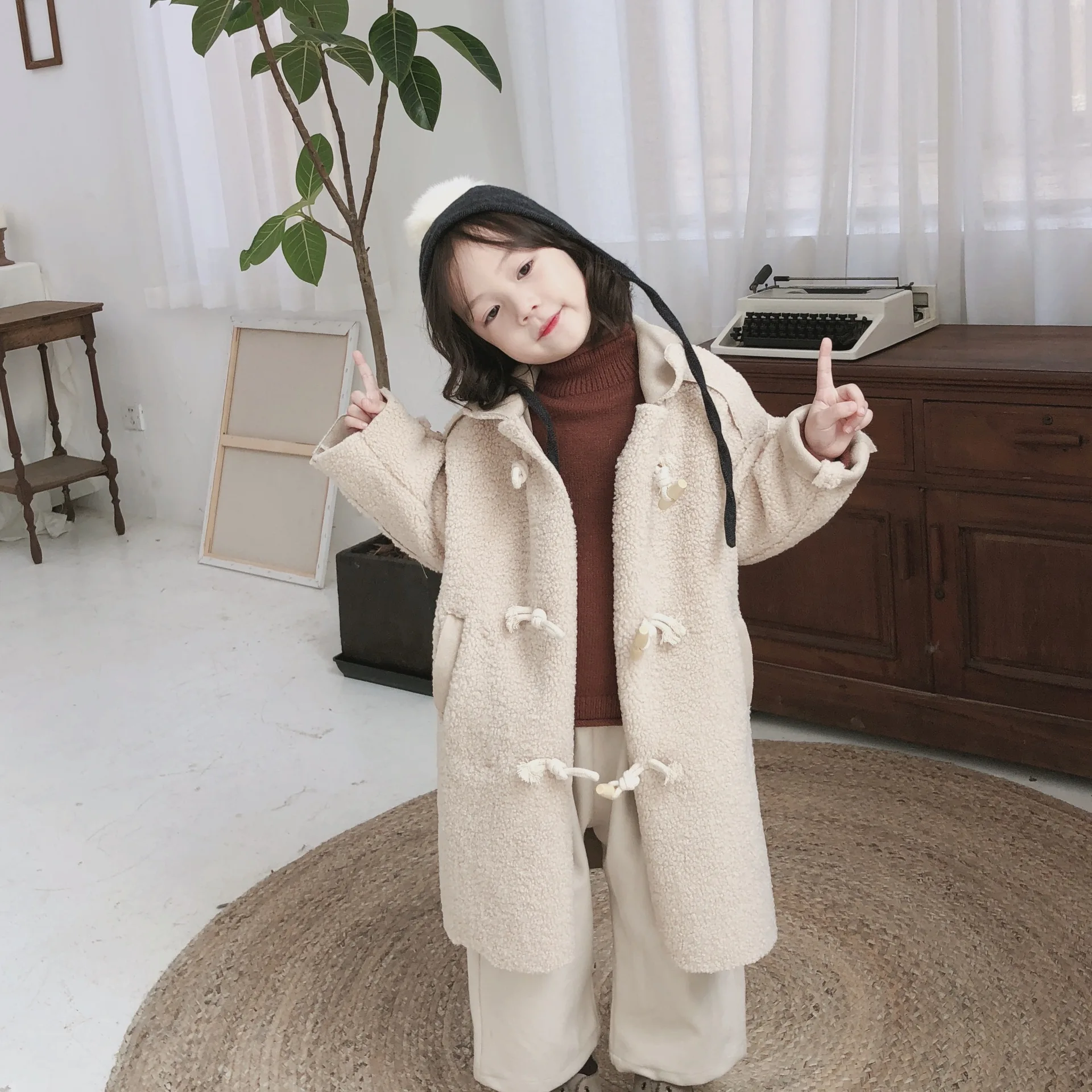 

2019 Autumn winter male and female fur integrated lamb hair long coat loose warm