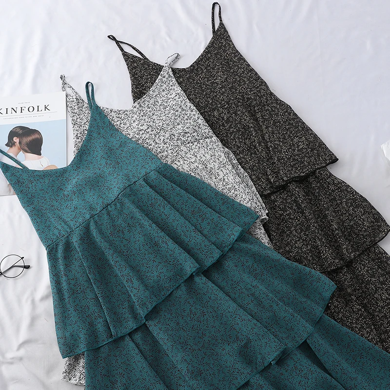 

2019 Spring and summer shredded flower sling Dress retro temperament V collar thin layer cake medium A word dress zi tide