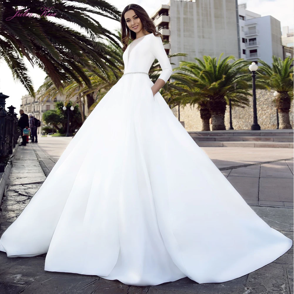 

Julia Kui Luxurious Satin Princess A- Line Wedding Dress With Illusion V-neck And Beaded Sashes