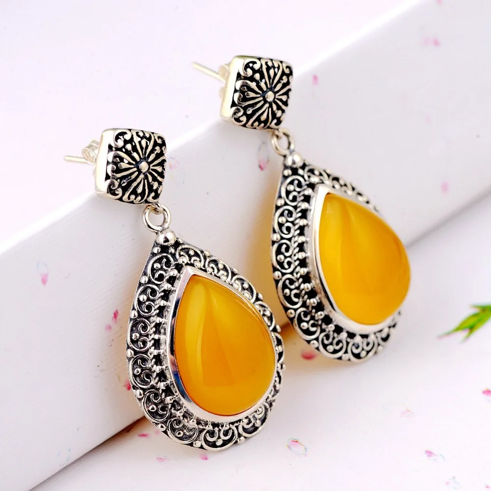 

S925 silver inlaid silver antique jewelry new earrings, personalized fashion simple and easy to match at the reception.