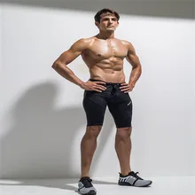 Бренд Для мужчин тренажерный зал Фитнес Бег Спорт Шорты для женщин Для мужчин профессионального бодибилдинга Training Плотные брюки быстросохнущая Мужчина запустить одежда дно