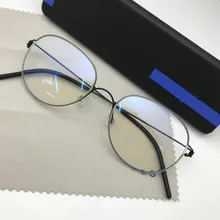 Monturas de gafas de titanio ovaladas para hombre, monturas de gafas de titanio, sin tornillos, miopía, lente clara de Anteojos