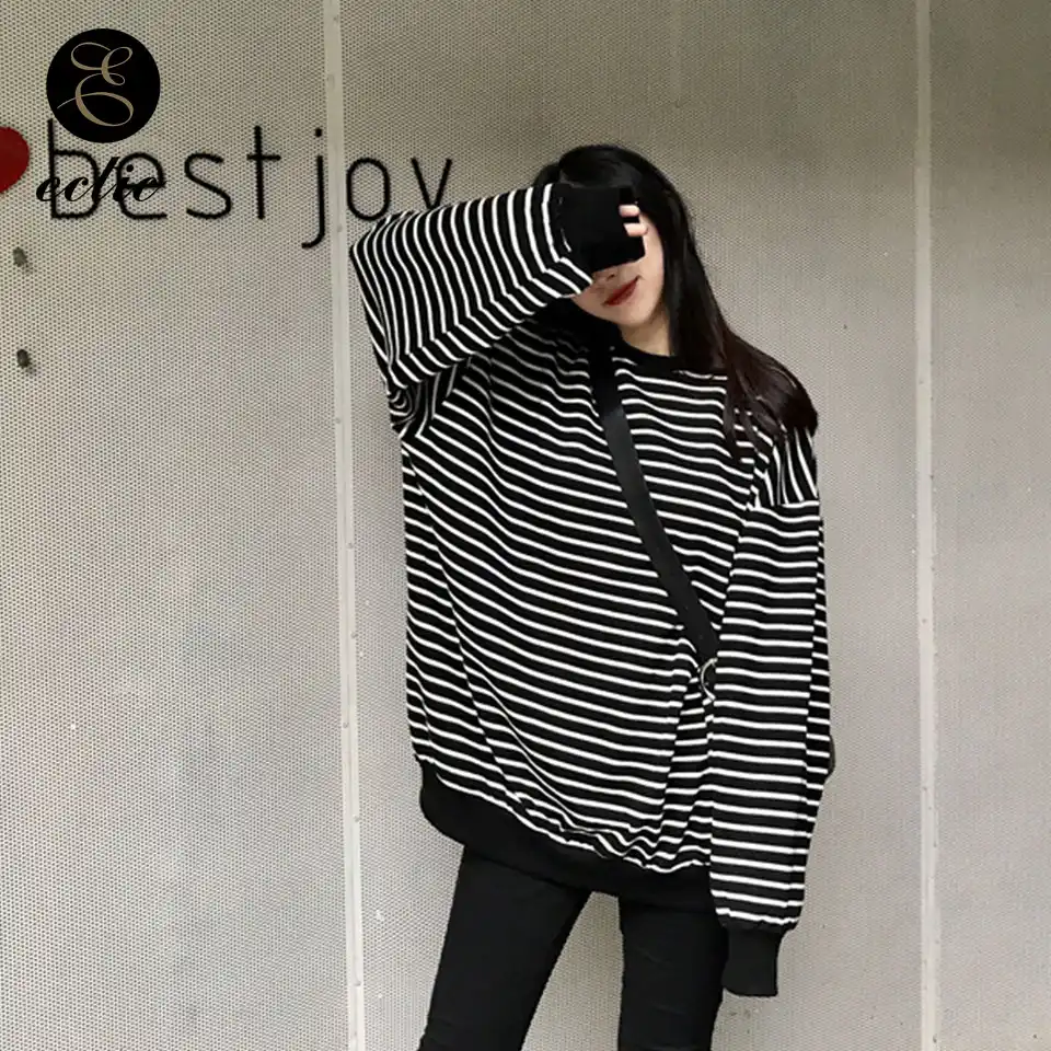 white sweatshirt with black stripes