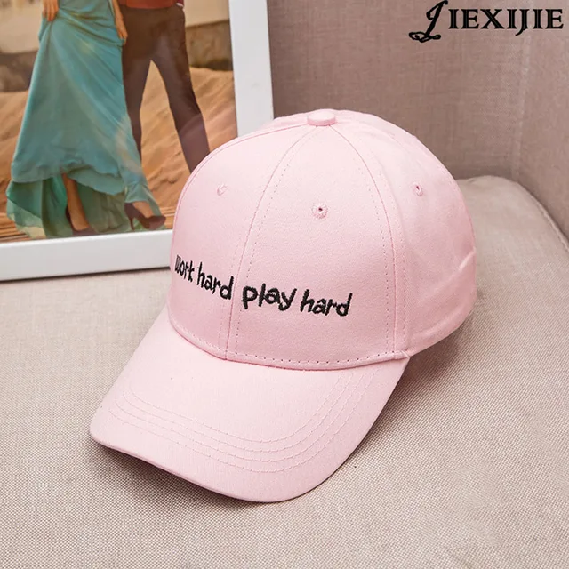 men in pink hats