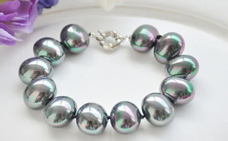 

>>>>> PEACOCK BLACK EGG SOUTH SEA SHELL PEARL BRACELET