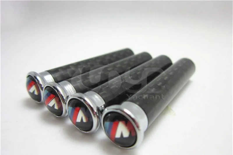 الشحن مجانا 4 قطع ألياف الكربون قفل تعديل الباب دبوس لجميع نموذج سيارة و bmw e92 e93 f01 f30 f20 f10 f15 F13 m3 m5 x1 x3 x5 x6