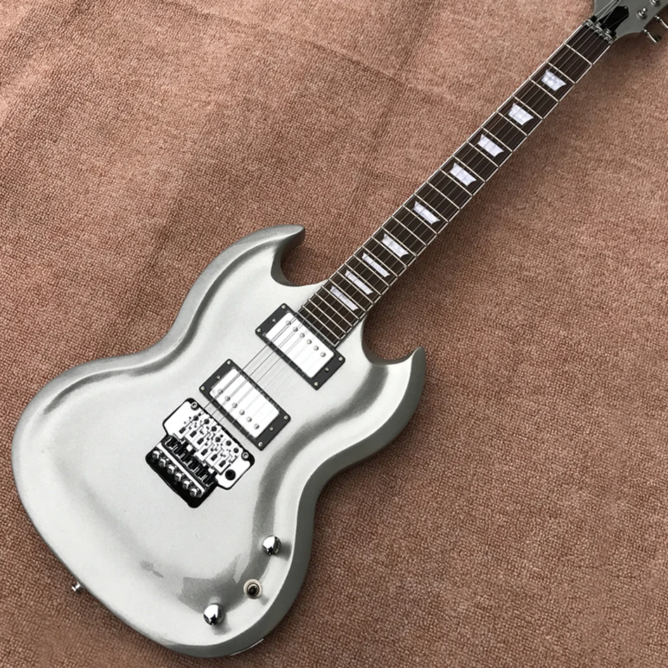 

New high quality custom handmade electric guitar, Silver metal grooved electric guitar Chrome tremolo system, free shipping