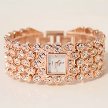 

Women's Quartz Watch New Hot High-End Linked List Full Rhinestone Pearl Mother-Of-Pearl Small Dial Pearl Female Watch