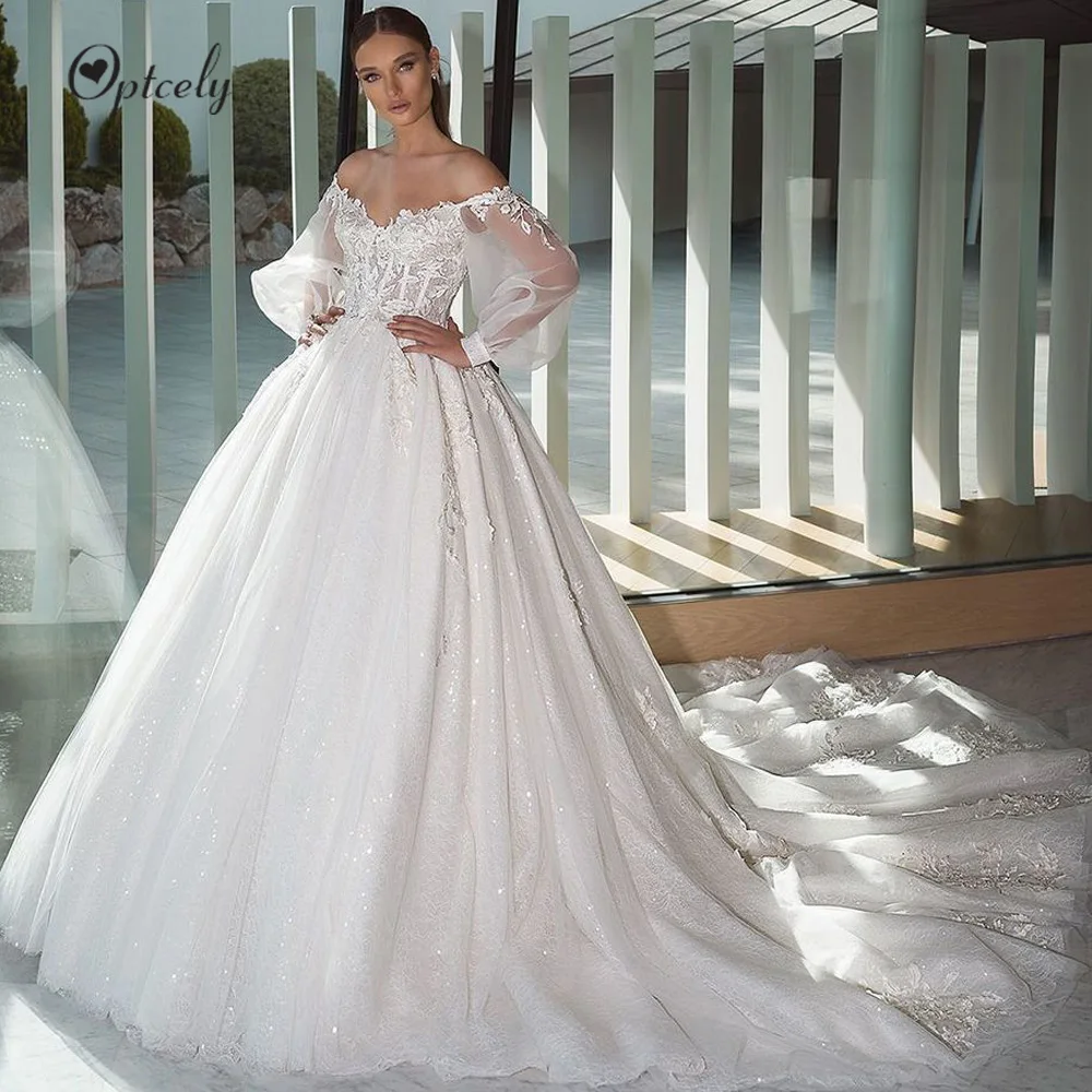

Optcely Illusion Boat Neck Lace Beach A-Line Wedding Dresses 2019 Elegant Appliques Puff Sleeve Sweep Train Vintage Bridal Gown