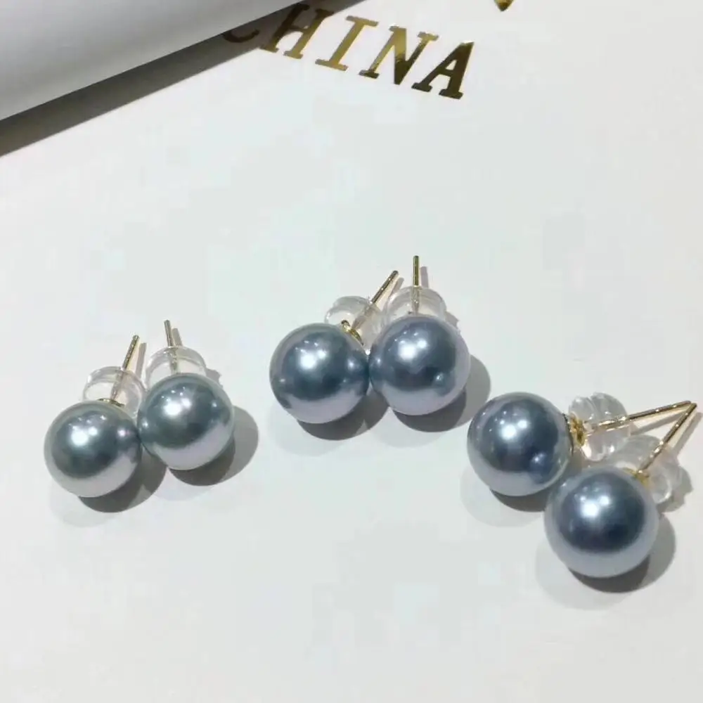 

three pair of 9-10mm south sea silver grey pearl earrings 18k