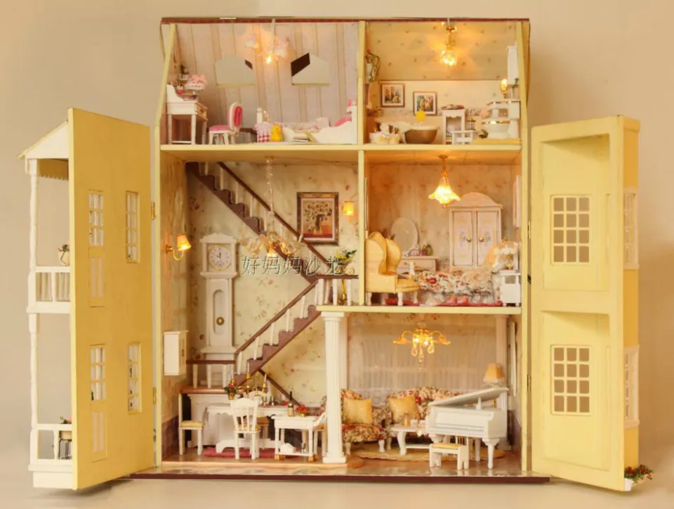 wooden dollhouse with lights