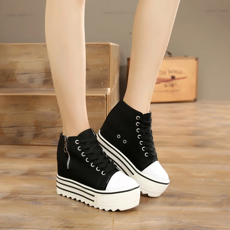 

Spring and autumn new muffin high-heeled canvas shoes women's zipper adds a versatile casual shoes.