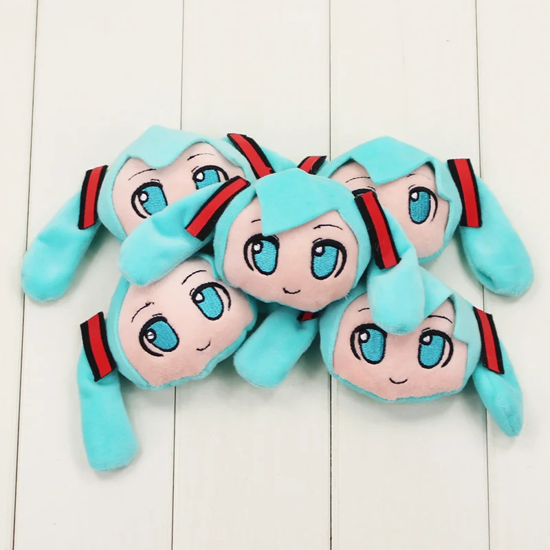 

1pc 7cm Japanese Anime Cartoon Hatsune Miku plush toy Smiling keychain key ring Doll Pendant