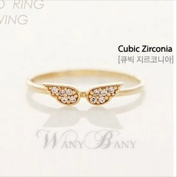 

Mini order $1) Simple and elegant and generous fashion tide compact flash imitation ring angel wings CRD83